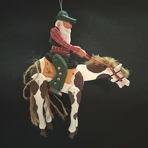 Vintage moving parts cowboy and horse ornament